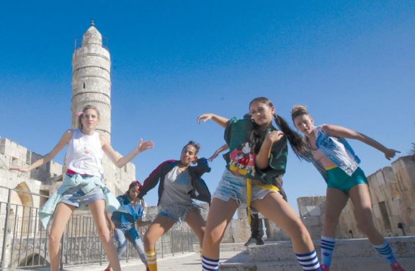 DANCERS OUTSIDE the Tower of David in the capital are filmed yesterday as part of a hip hop video that hopes to portray the city as a cool place to visit. ( (photo credit: MARC ISRAEL SELLEM/THE JERUSALEM POST)