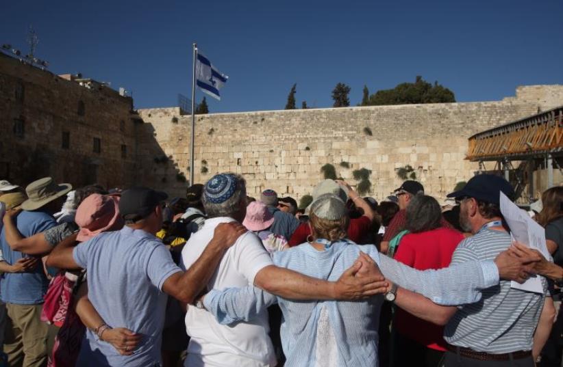 Egalitarian prayer rally at the upper plaza of the Western Wall  (photo credit: MARC ISRAEL SELLEM/THE JERUSALEM POST)