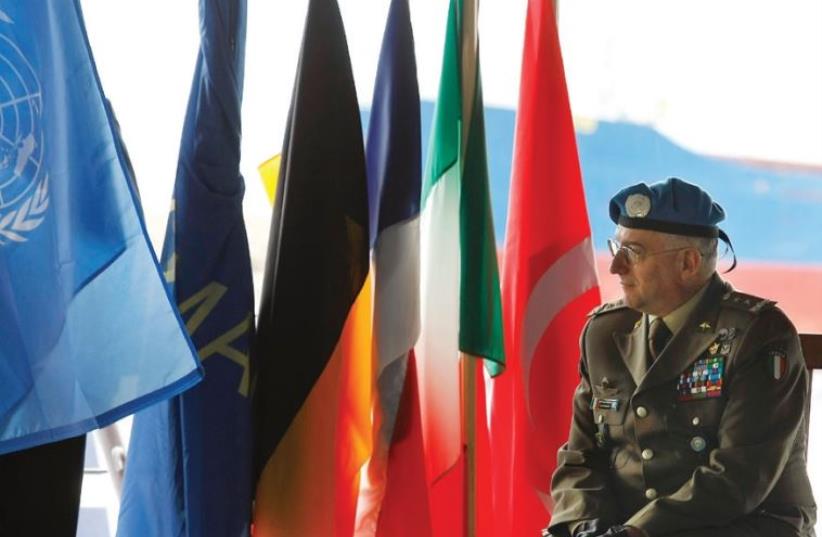UNIFIL Force Commander Major General Graziano sits aboard the French flagship FS De Grasse during a change of command ceremony in 2009 (photo credit: REUTERS)