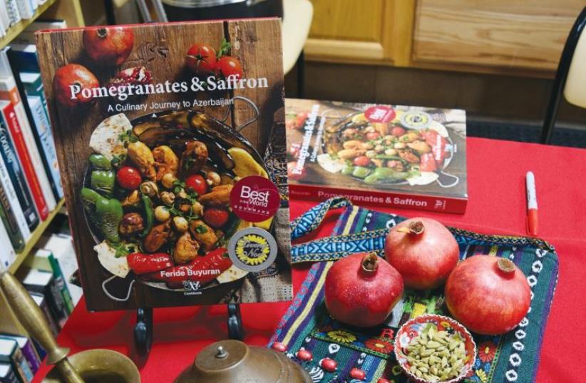 Feride Buyuran's award winning cookbook highlights the great use of pomegranates, cardamom and basmati rice in Azerbaijani cuisine (photo credit: YAKIR LEVY)