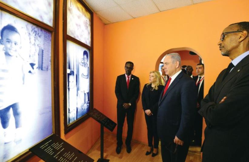 Prime Minister Benjamin Netanyahu and his wife, Sara, visit the remembrance site for the victims of the 1994 Rwanda genocide in Kigali, Rwanda, on July 6 (photo credit: KOBI GIDEON/GPO)