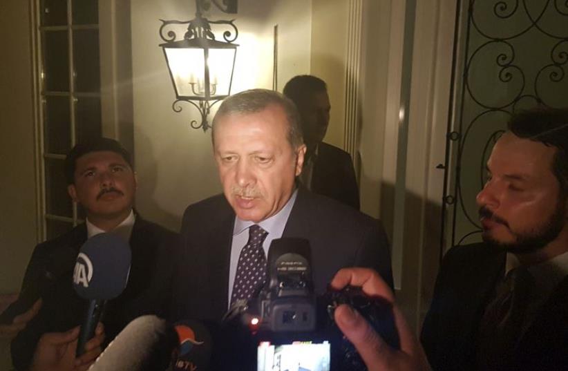 Turkish President Tayyip Erdogan speaks to media in the resort town of Marmaris, Turkey (photo credit: REUTERS)