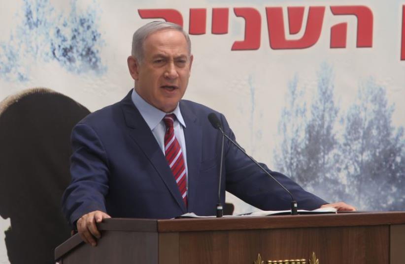 Prime Minister Benjamin Netanyahu addresses a memorial ceremony at Mount Hertzl in Jerusalem for Israel's fallen in the Second Lebanon War, July 19, 2016 (photo credit: MARC ISRAEL SELLEM)
