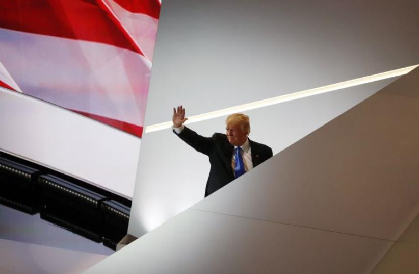 Republican U.S. presidential candidate Donald Trump waves as he leaves the stage at the Republican National Convention in Cleveland, Ohio, USA (photo credit: REUTERS)