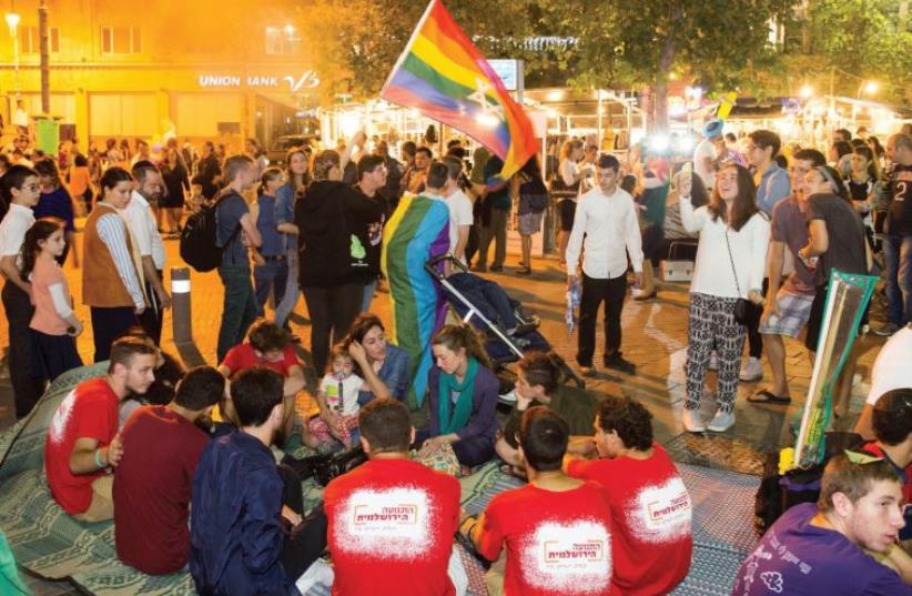 ‘This meeting between a visibly LGBT person and haredi people was unprecedented’: An post-parade stabbing ‘encounter’ in Zion Square (photo credit: NOAM FEINER)