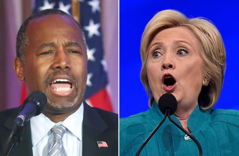 Carson and Clinton (photo credit: REUTERS)