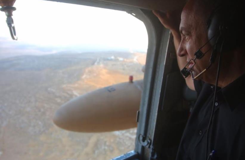 Prime Minister Benjamin Netanyahu flies plane over West Bank (photo credit: MARC ISRAEL SELLEM/THE JERUSALEM POST)