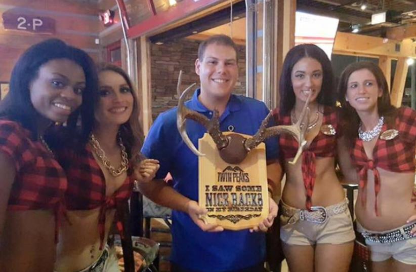Matthew Kuppe, center, posing in a Facebook post dated Aug. 9, 2015 with the caption, “This is how you celebrate 21!” (photo credit: FACEBOOK)