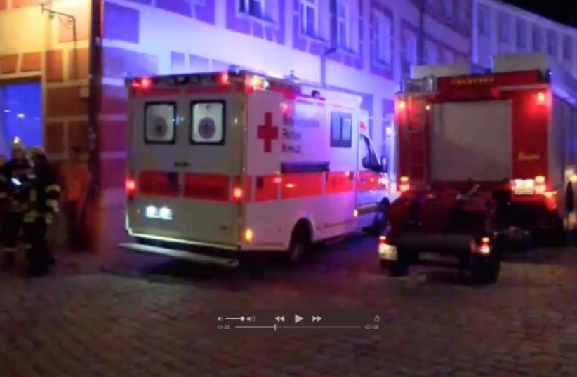 Video grab of emergency workers and vehicles following an explosion in Ansbach. (photo credit: COURTESY NEWS5/VIA REUTERS)