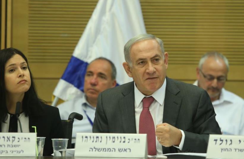 Prime Minister Benjamin Netanyahu at the Knesset State Control Committee, July 25, 2016‏ (photo credit: MARC ISRAEL SELLEM)
