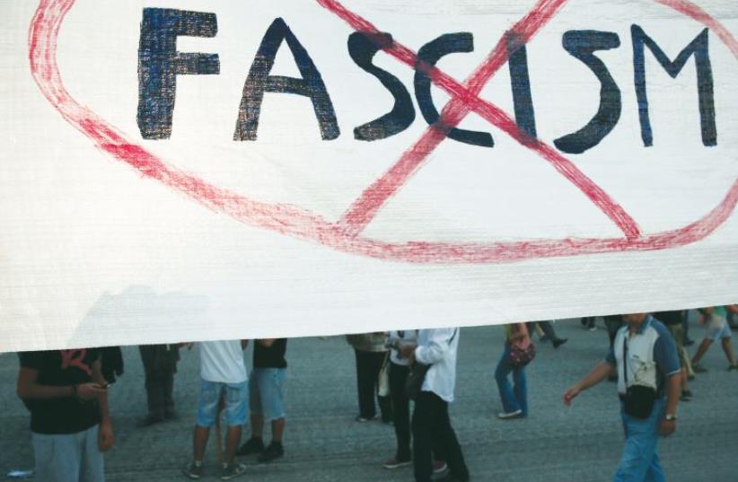 NOT APPLICABLE to Israel. Protesters take part in an anti-fascist rally in Athens in 2013. (photo credit: REUTERS)
