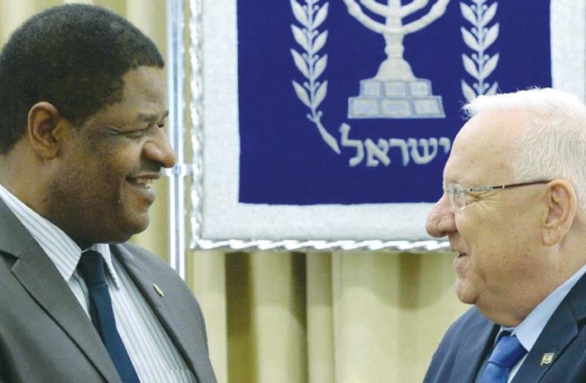 PRESIDENT REUVEN RIVLIN meets President of the Economic Community of West African States Marcel Alain de Souza on Monday. (photo credit: Mark Neiman/GPO)