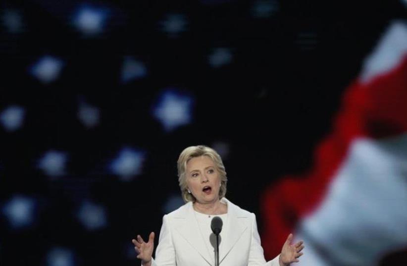 Democratic U.S. presidential nominee Hillary Clinton accepts the nomination on the fourth and final night at the Democratic National Convention in Philadelphia, Pennsylvania, U.S. July 28, 2016. (photo credit: REUTERS)