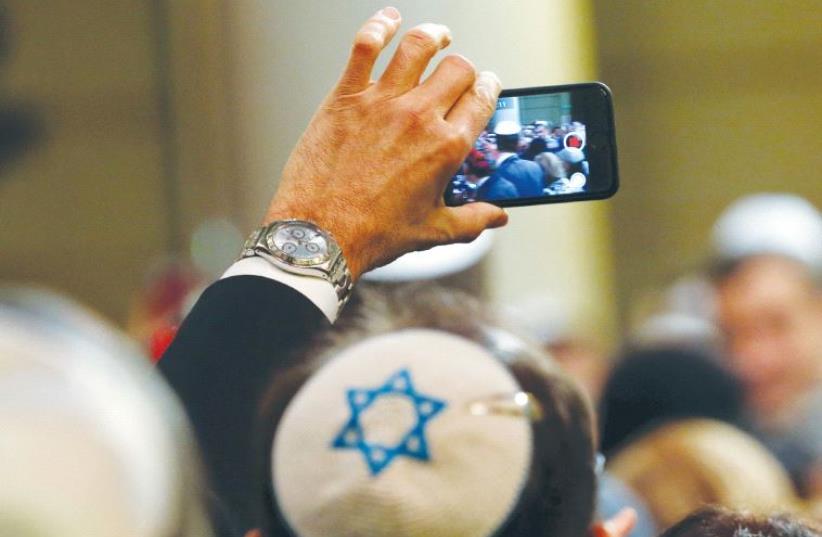 HOW MANY potential Jews are in the photo? (photo credit: REUTERS)