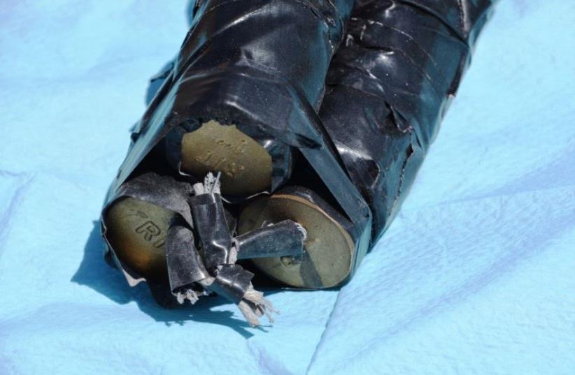 Pipe bombs found in the bag carried by Ali Abu Hassan, who planned an attack on the Jerusalem light rail on July 17 (photo credit: POLICE SPOKESPERSON'S UNIT)