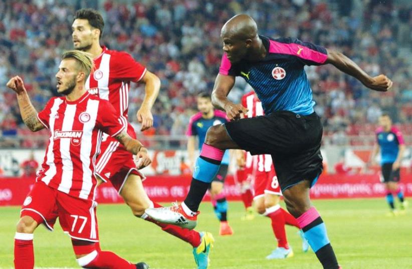 Hapoel Beersheba hopes Anthony Nwakaeme (right) can find the target tonight, as the Israeli champion will likely need at least one second-leg score at home to overcome Olympiacos in the Champions League third qualifying round following last week’s scoreless draw to open the tie. (photo credit: UDI ZITIAT)