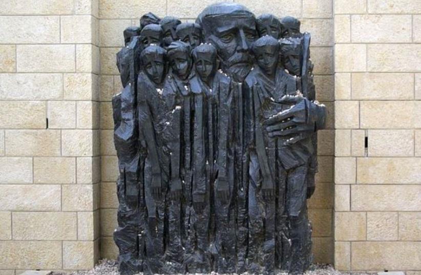 Janusz Korczak and the children, memorial at Yad Vashem. (photo credit: Wikimedia Commons)