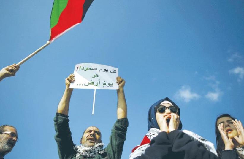 BEDUIN TAKE part in a rally marking Land Day in Umm al-Hiran in March. (photo credit: REUTERS)