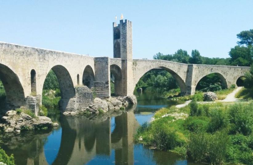 The medieval bridge at the entrance of Besalu (photo credit: AYA MASSIAS)