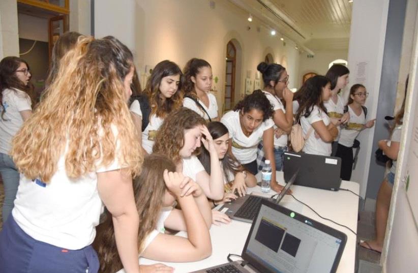 Teen girls study at a cyber-tech summer camp in Beersheba  (photo credit: DUDU GREENSHPHAN)