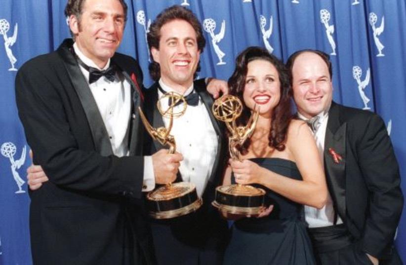 The cast of the NBC TV series Seinfeld pose together in 1993 (photo credit: REUTERS)