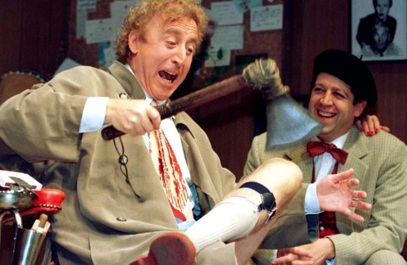 American actor Gene Wilder (L) performs alongside compatriot Rolf Saxon, during the rehearsal of a scene from Neil Simon's 'Laughter on the 23rd Floor', in New York, October 2, 1996.  (photo credit: REUTERS)