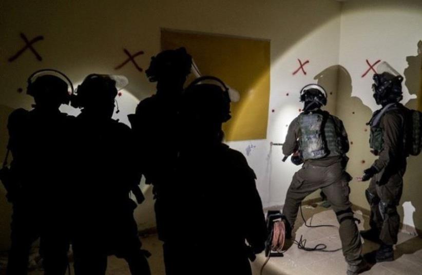 Israeli forces demolish West Bank house of Palestinian involved in July shooting attack that killed Rabbi Michael Mark (photo credit: IDF SPOKESMAN’S UNIT)