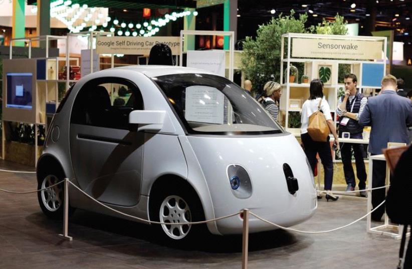 A SELF-DRIVING car by Google is displayed at the Viva Technology event in Paris, France, in June. (photo credit: REUTERS)