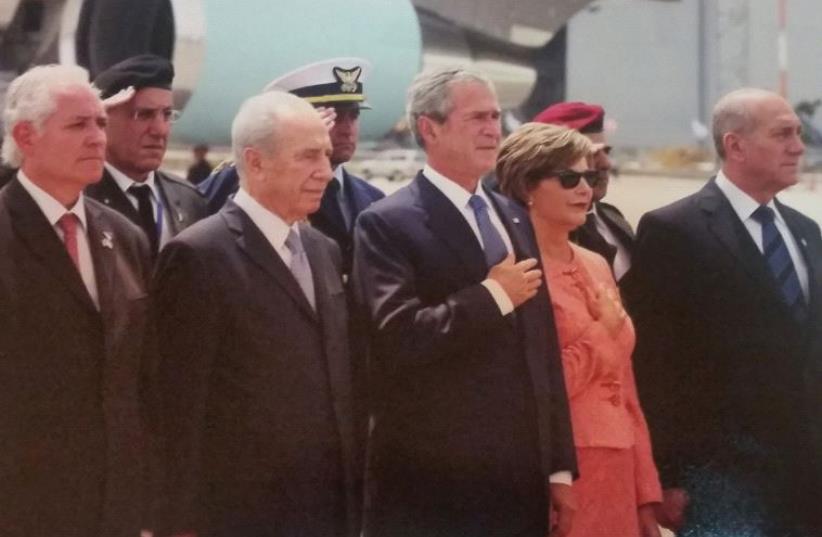 (Left) Yitzhak Eldan, president Shimon Peres and prime minister Ehud Olmert (right) with US president George W. Bush and first lady Barbara Bush on a May 2008 visit to Tel Aviv (photo credit: AVI DODI)