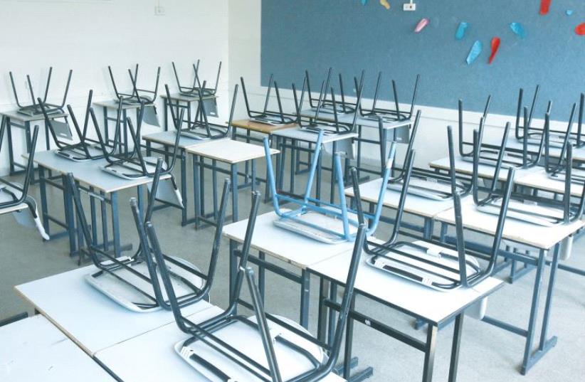 A CLASSROOM awaits its pupils. (photo credit: MARC ISRAEL SELLEM)