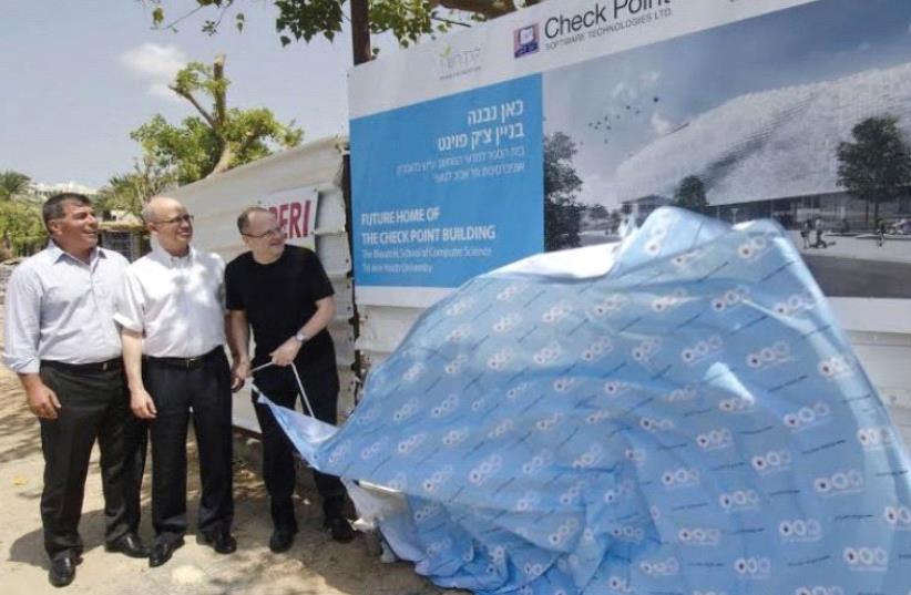 FROM LEFT to Right, Maj.-Gen. (res.) Gabi Ashkenazi, TAU President, Prof. Joseph Klafter and Gil Shwed at the cornerstone ceremony for TAU’s new School for Computer Sciences. (photo credit: Courtesy)