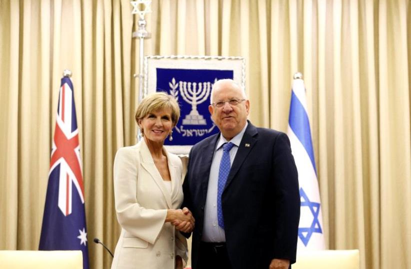 Australia's foreign minister Julie Bishop (L) shakes hands with Israel's President Reuven Rivlin during their meeting at the president's residence in Jerusalem September 4, 2016 (photo credit: REUTERS/AMIR COHEN)