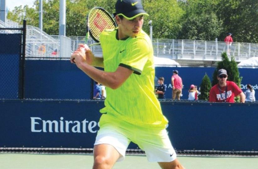 ISRAELI TEENAGER Yshai Oliel staged an impressive comeback on Sunday to advance to the second round of the US Open juniors event. (photo credit: HOWARD BLASS)