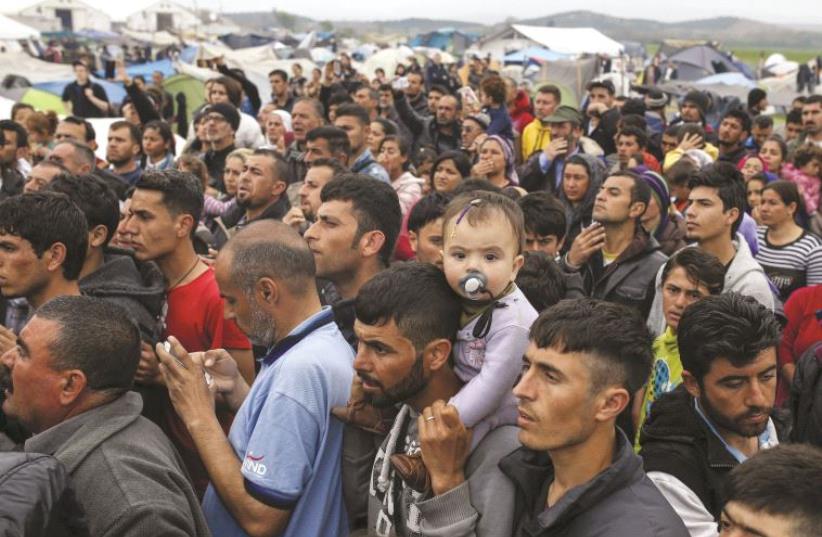 Arrivée de migrants en Europe (photo credit: REUTERS)