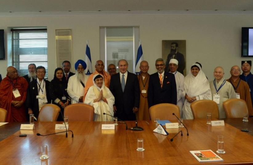 Prime Minister Benjamin Netanyahu meets with  meet with leaders of Eastern faith traditions (photo credit: HAIM ZACH/GPO)