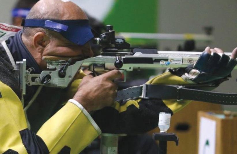 Israeli shooter Doron Shaziri won his eighth Paralympic medal yesterday, finishing third in the men’s 50-meter rifle three positions final. ( (photo credit: KEREN ISAACSON)