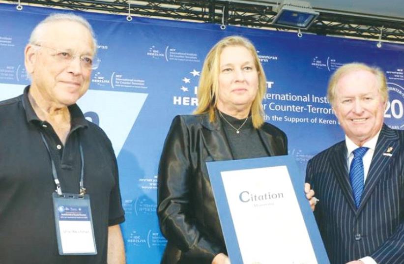 FROM LEFT: Prof. Uriel Reichman, former president of IDC Herzliya, Tzipi Livni and Denis Monette. (photo credit: OFER AMRAM)