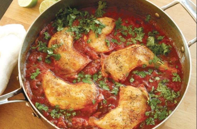 Skillet-braised Chicken with Tomatoes, Olives and Capers. (photo credit: J. KENJI LÓPEZ-ALT)