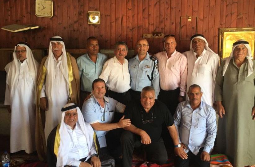 : Southern District Police Commander Major General David Bitan meets with Beduin community leaders (photo credit: COURTESY ISRAEL POLICE)