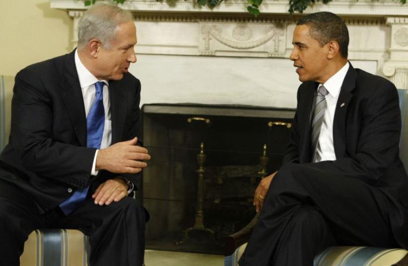 U.S. President Barack Obama (R) meets with Israel's Prime Minister Benjamin Netanyahu in the Oval Office of the White House in Washington, May 18, 2009 (photo credit: REUTERS)