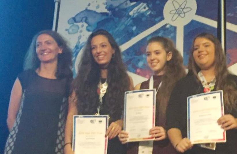 THREE OF the Israeli prize-winners pose in Brussels (photo credit: BLOOMFIELD SCIENCE MUSEUM)