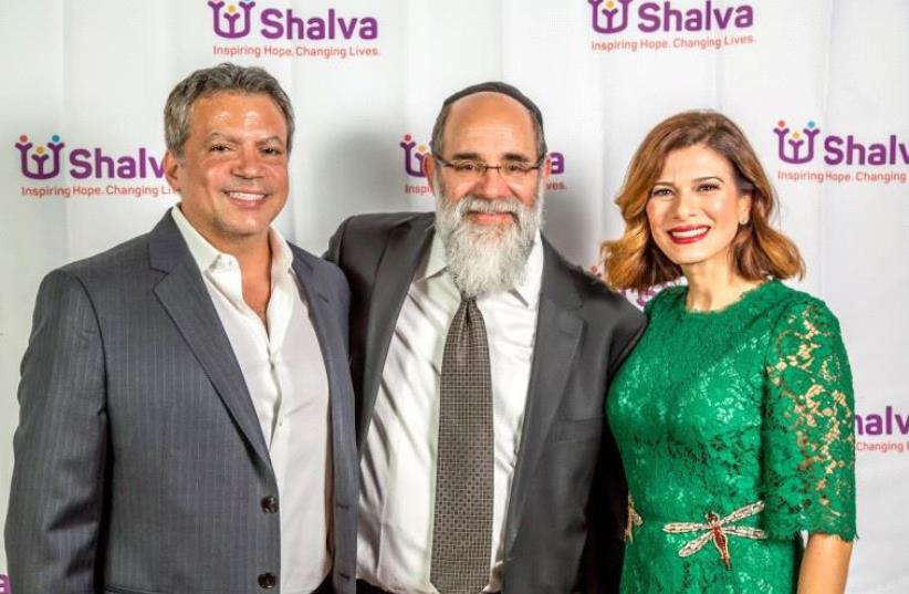 (L-R) Oscar nominated movie producer Michael De Luca, Kalman Samuels and Ms. Angelique De Luca enjoy the moment at SHALVA'S inaugural fund-raising event in Los Angeles, which attracted the creme de la creme of Hollywood society (photo credit: LINDA KASIAN)