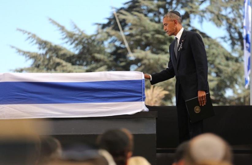 US President Barack Obama paying respects to the late Shimon Peres. (photo credit: EMIL SALMAN/POOL)