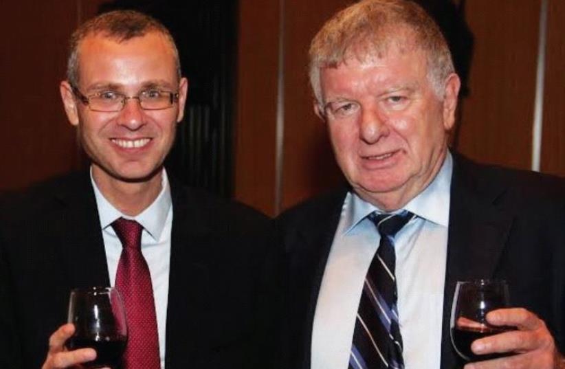 TOURISM MINISTER Yariv Levin (left) with Eli Gonen, president of the Israel Hotel Association. (photo credit: Courtesy)