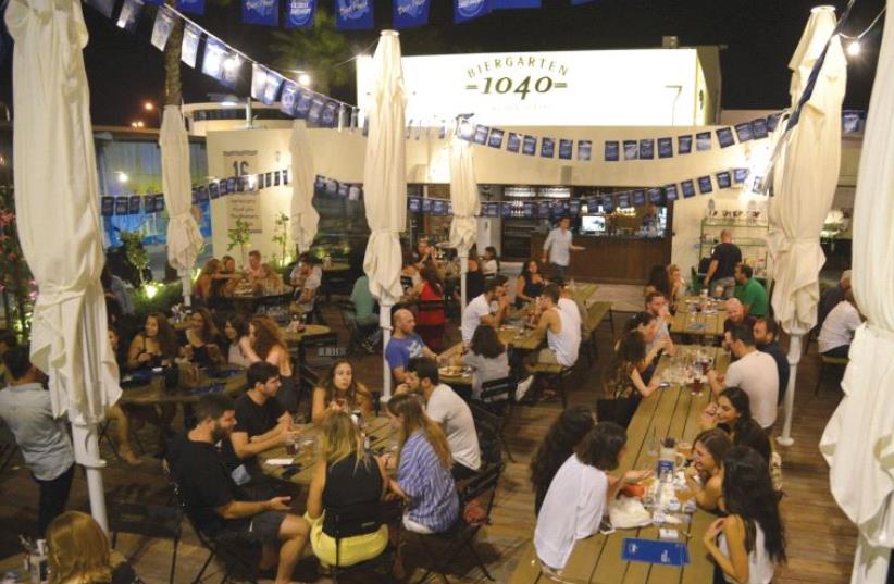 The new Tel Aviv beer garden’s titular inspiration comes from the Abbey of Weihenstephan, the world’s oldest brewery (photo credit: TAMAR MATSAFI)