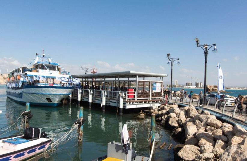 A FERRY that will run twice daily from Haifa to Acre and back docks at the Haifa port. (photo credit: ITAMAR GRINBERG)