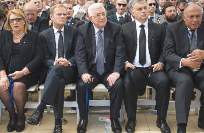 PALESTINIAN AUTHORITY President Mahmoud Abbas attends Shimon Peres’s funeral at Mount Herzl on September 30 (photo credit: REUTERS)