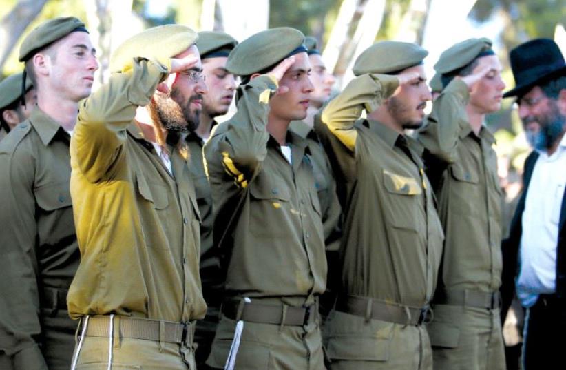 Soldiers who will serve in the IDF’s Nahal Haredi unit are sworn in (photo credit: MARC ISRAEL SELLEM)