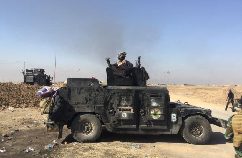 Iraqi forces outside Mosul. (photo credit: SETH J. FRANTZMAN)