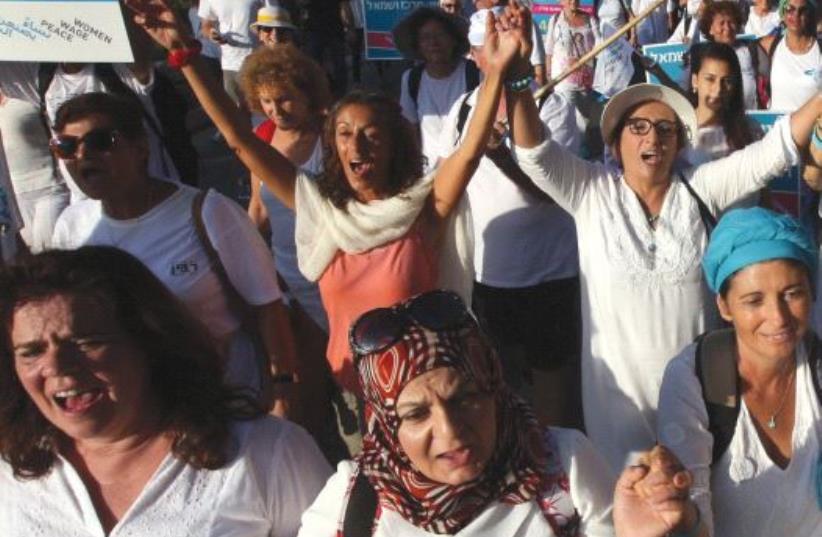 THE MARCH OF HOPE, organized by Women Wage Peace, makes its way to the Prime Minister’s Residence in Jerusalem last week. (photo credit: MARC ISRAEL SELLEM/THE JERUSALEM POST)